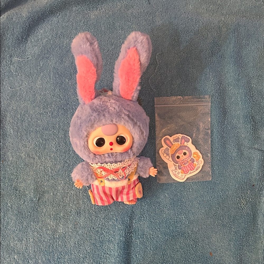 Cute Plush Bunny Toy with Striped Outfit. Latest from Pop Mart
